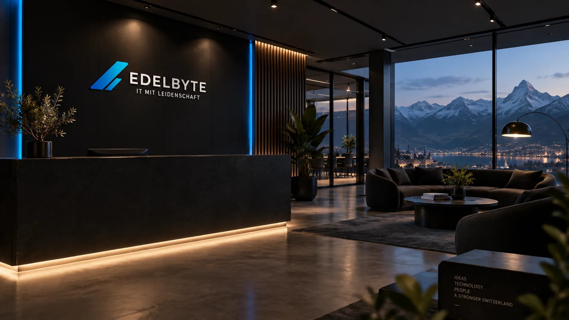 Empfangsbereich mit EdelByte-Schriftzug, Blick auf See und Berge