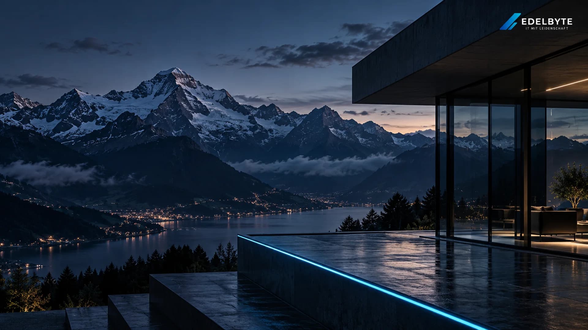 Bergsee in der Dämmerung, davor ein Betonbau mit blauer Lichtlinie